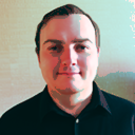 A male hitman dressed in unassuming fashionable clothing standing in a quiet coffee shop observing a day-dreaming female barista who is leaning over the counter and reading an erotic novel